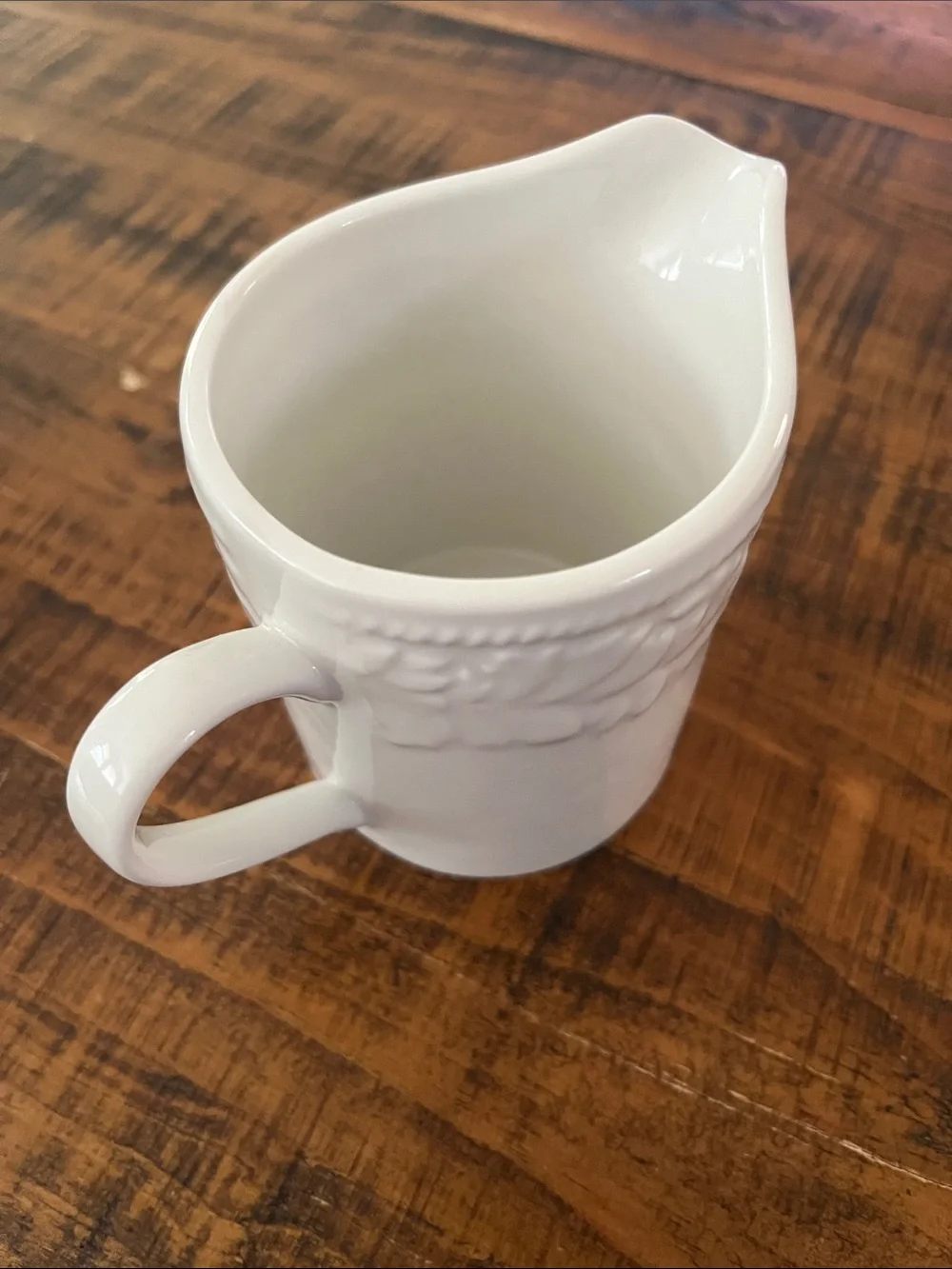 Classic White Ceramic Creamer with Embossed Detail